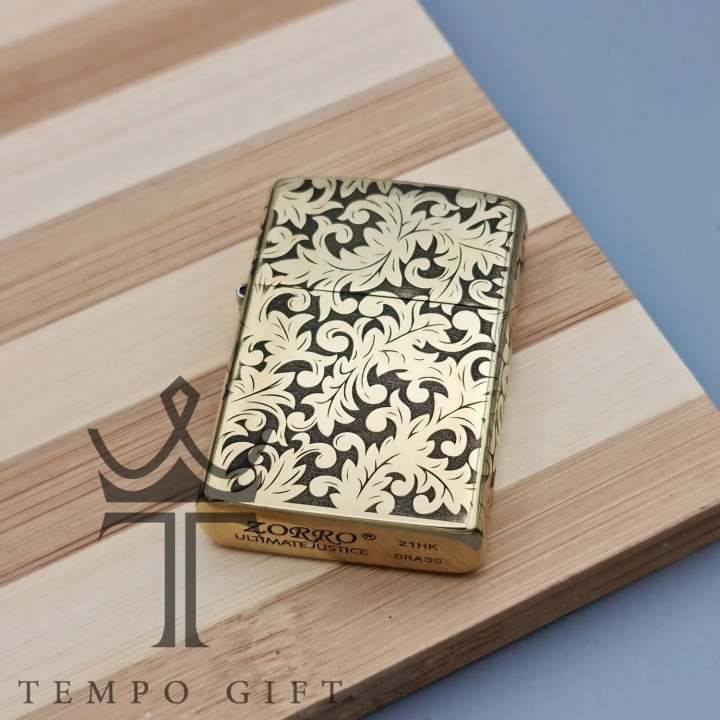 فندک بنزینی اورجینال زورو ZORRO مدل گلدار طلایی 2 فندک بنزینی اورجینال زورو ZORRO مدل گلدار طلایی 2